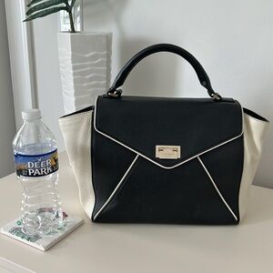 Kate Spade handbag in black and cream 9 inches tall x 15 inches wide